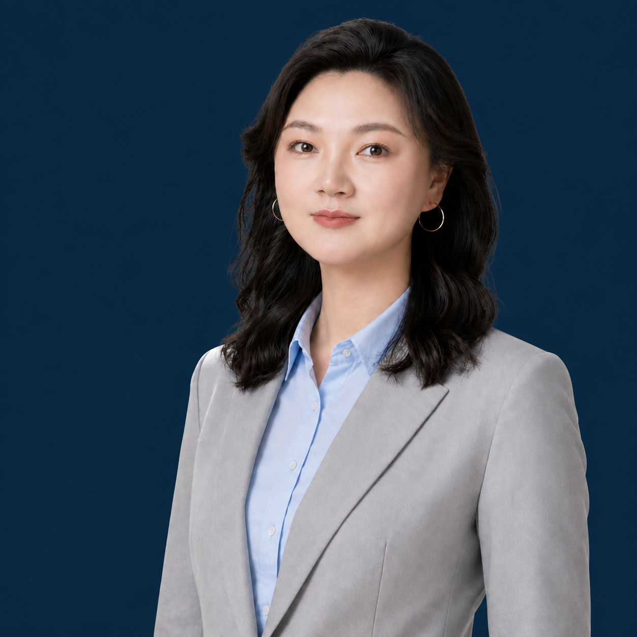 沃培优创始人刘蓓博士，灰色西装肖像
